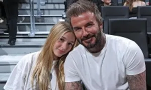Con gái Beckham gây chú ý khi đi xem bóng rổ cùng bố Con gái Beckham gây chú ý khi đi xem bóng rổ cùng bố